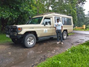 Athumani showing off his new Safari vehicle